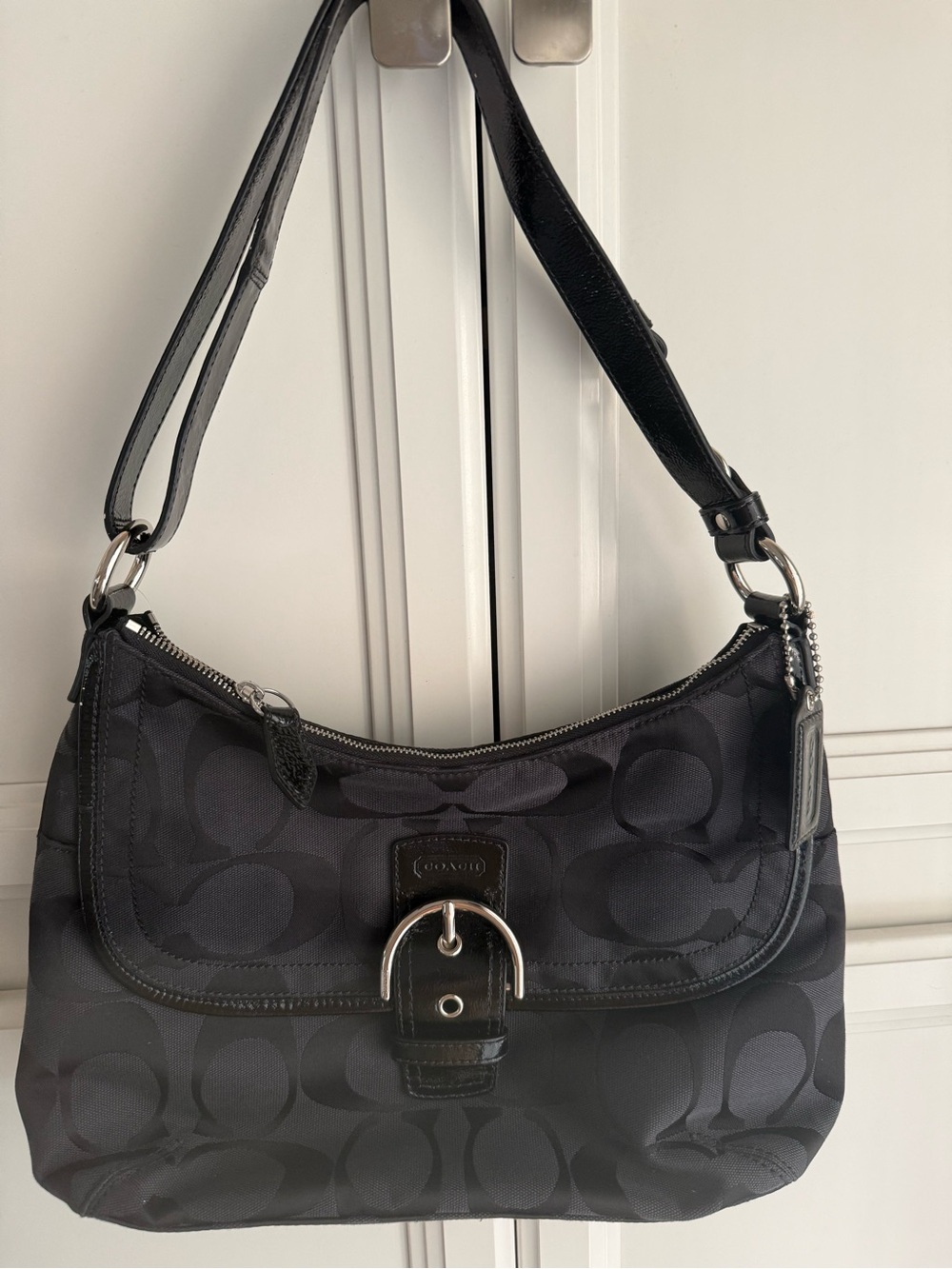 Brand new Coach Soho Signature Black & Silver Flap Hobo Bag. New With Tags